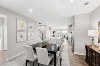 View from entry foyer - step into your new home with first floor owner's suite!