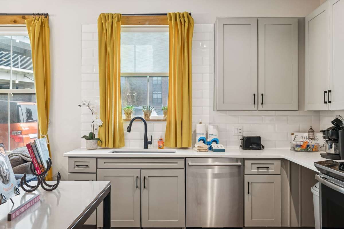 Kitchen with stainless steel appliances.