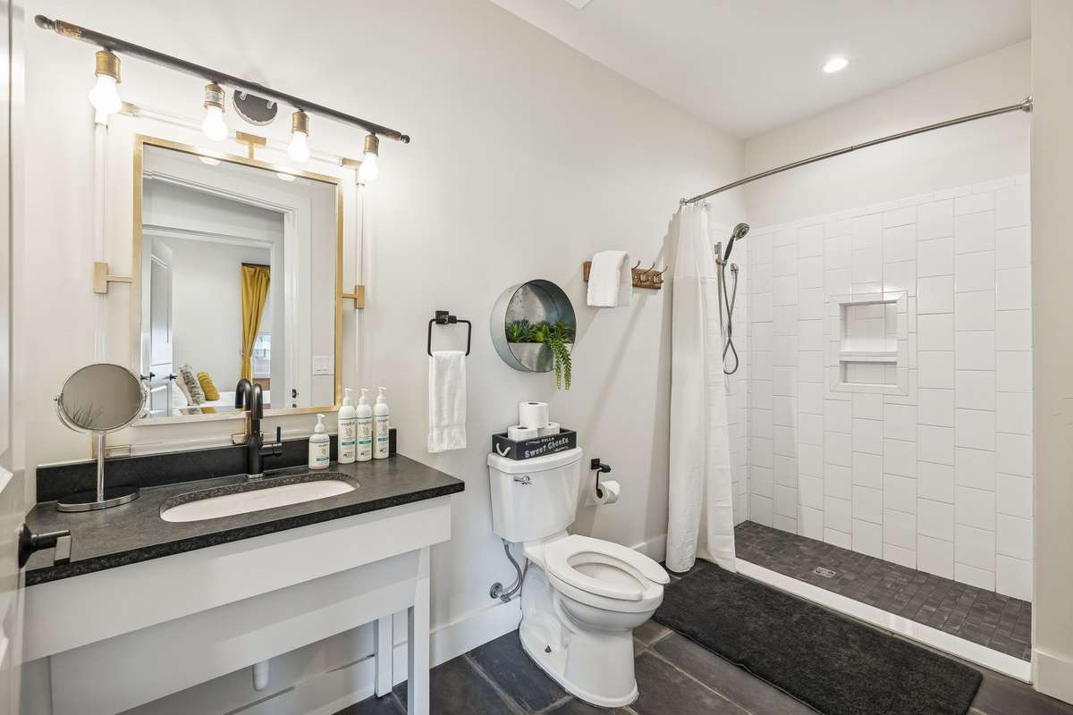 Spacious bathroom with walk-in shower.