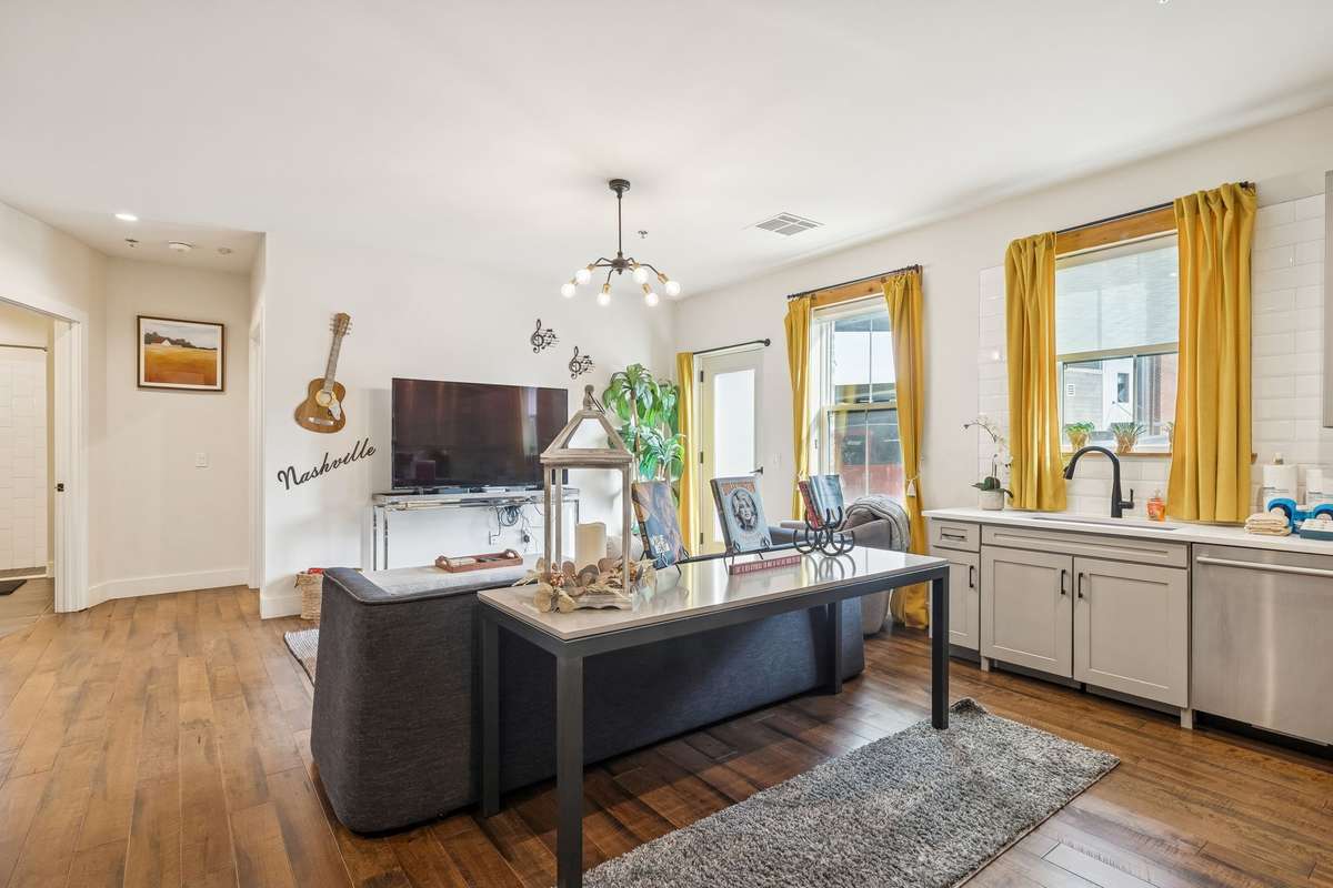 Windows in family room and kitchen.