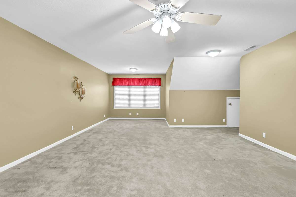 Spacious open living area in carriage house