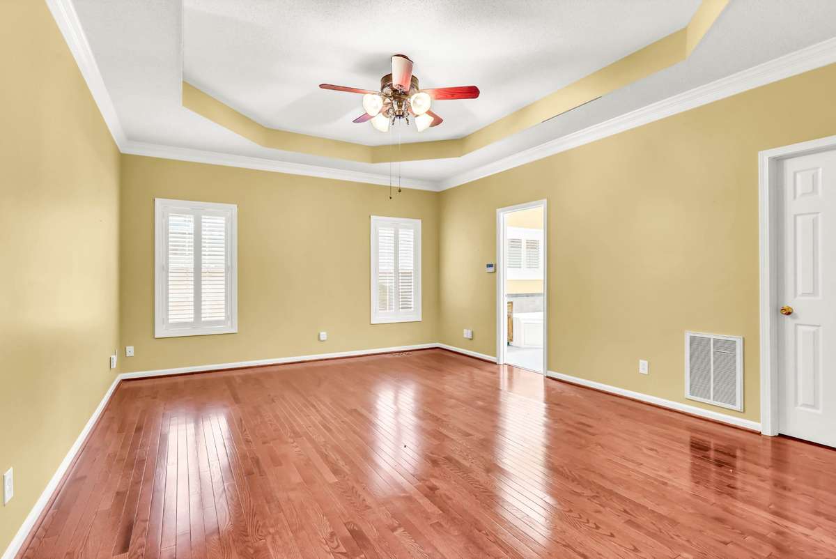 Master Suite with gorgeous trey ceiling & real wood floors