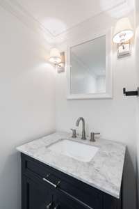 Elegant powder room with modern finishes.