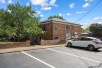 Nearby parking with access to green space.
