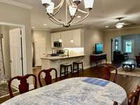 The long, granite countertop provides a great eat-in area in the kitchen and works perfectly with bar stools.