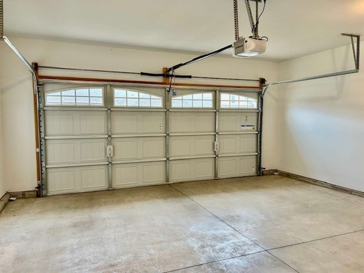 This home features a 2 car garage that includes 2 remote garage door openers.