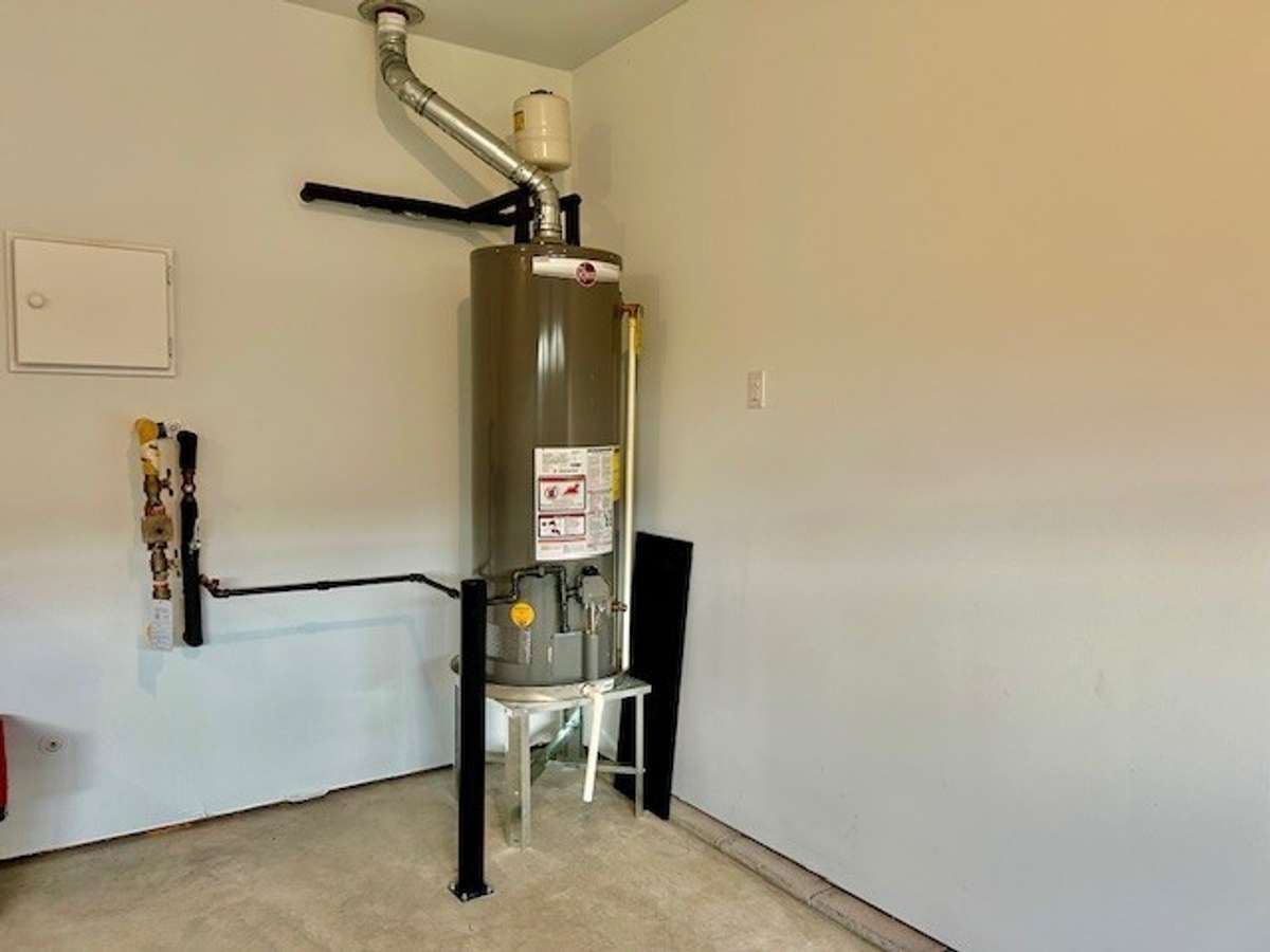 Home is also equipped with a gas hot water heater.