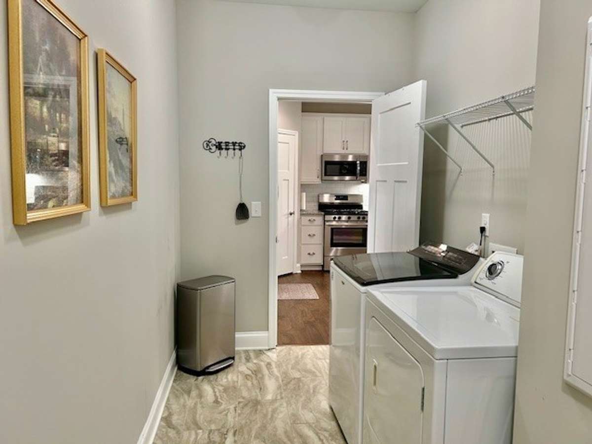 Don't worry about tracking in from the garage.  You can take your shoes off in the utility room as you enter the house.
