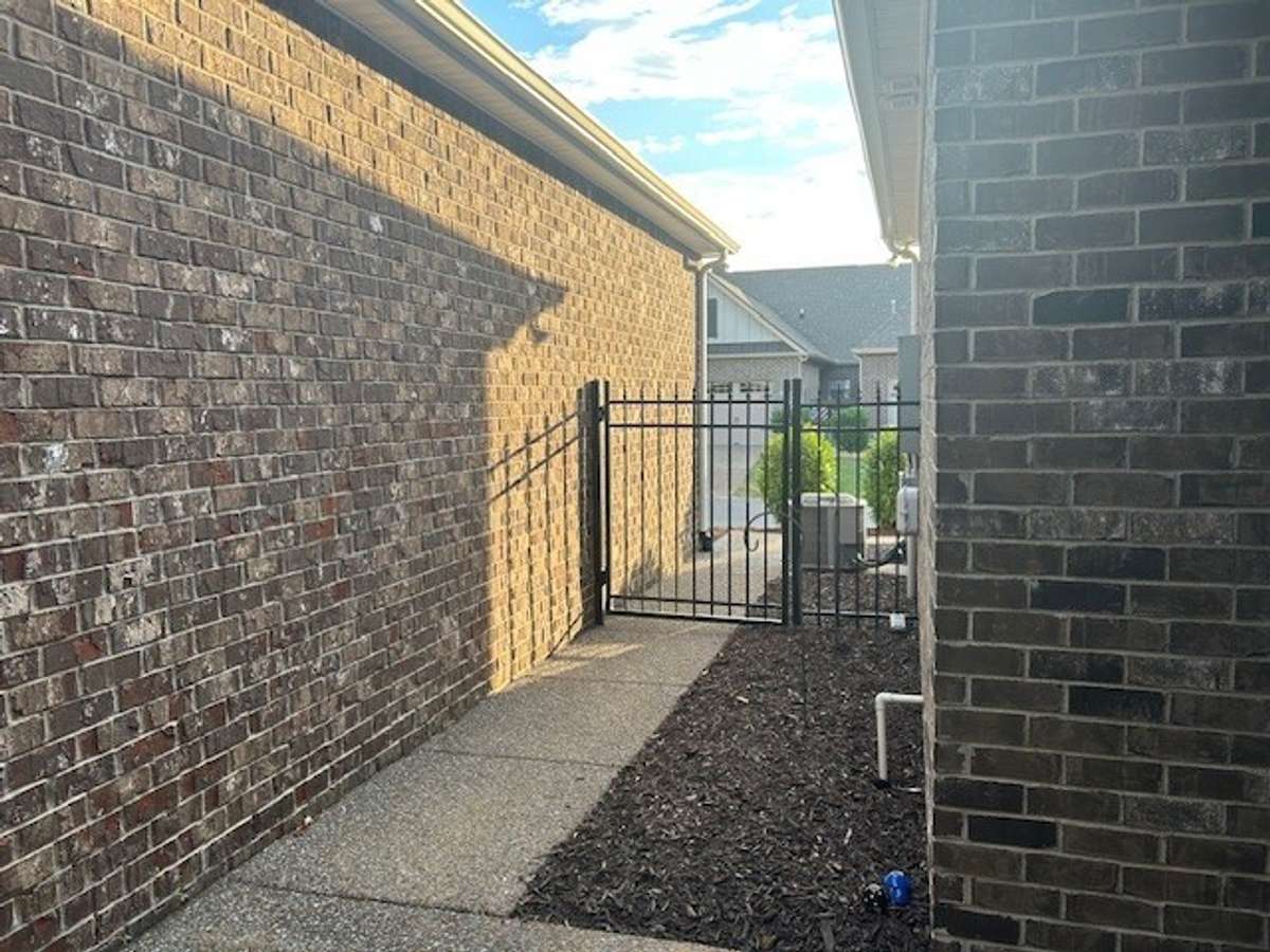 A gated entry into your courtyard will lead you to the back door.
