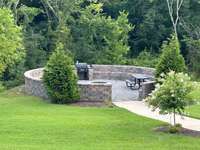 Entertain on cool nights at the community fire pit.