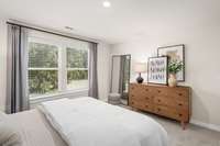 *Photo of our staged model home to show furniture and layout ideas