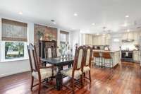 Past the living room is the large, open kitchen and dining room.