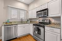 Granite countertops + stainless steel appliances
