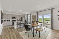 Dining and Kitchen space
(furnished model home photo) Pics may differ slightly from actual floorplan design and elevation.