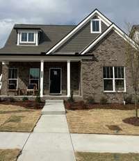 Photo is of our model home which is also an Oakwood Elevation C, actual finishes and selections may vary