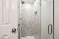 Newly tiled shower in the primary bathroom!