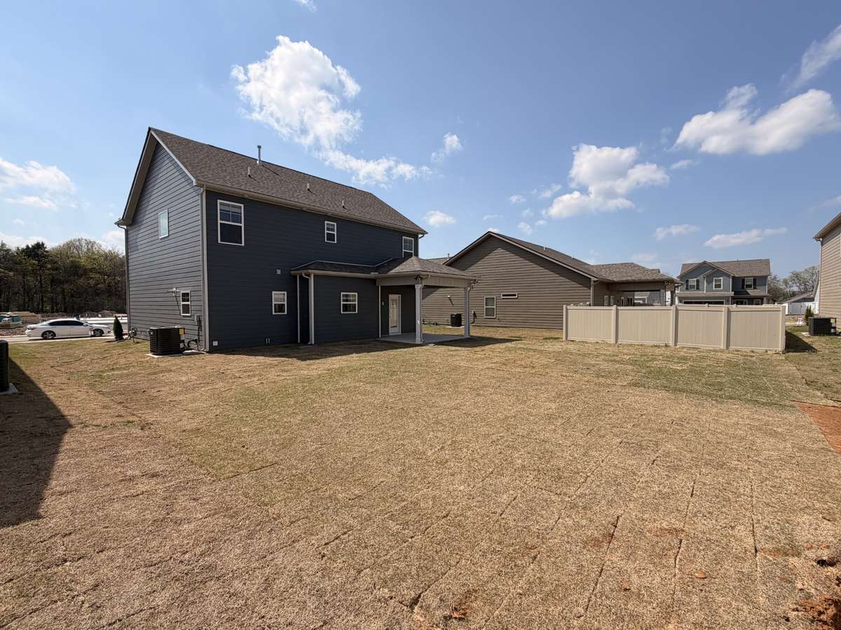 Photo showcases the highly sought after level back yard!