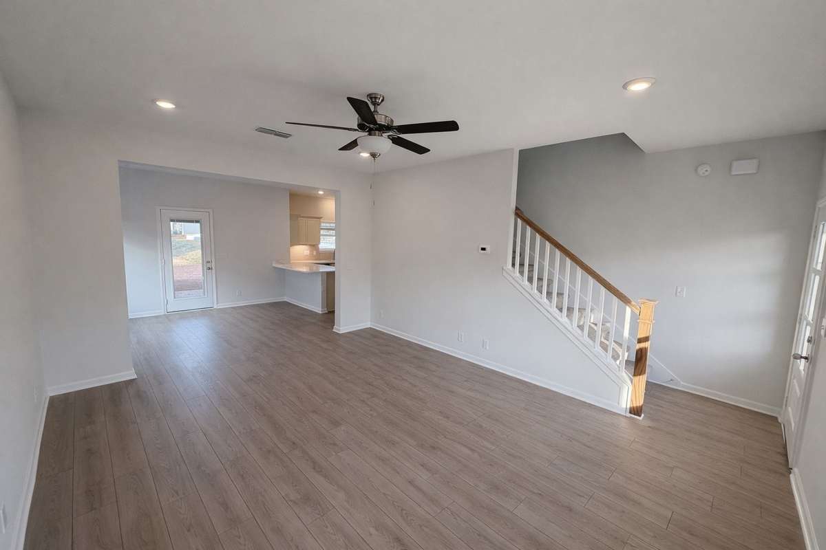 This home features sectioned rooms! Great room flows into the Breakfast Nook/Dining, then to the Kitchen!
