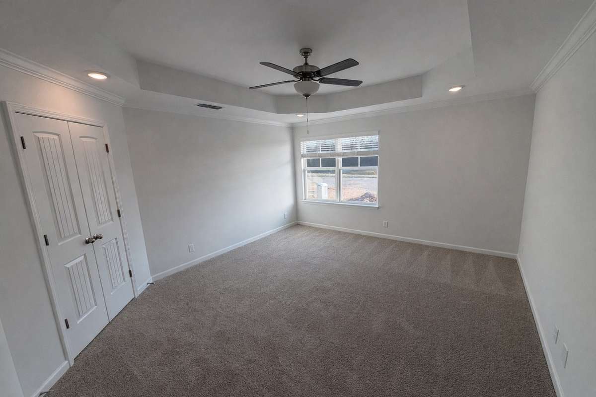 Primary Suite features a Trey Ceiling, extra LED lights and double door access to your bathroom & oversized closet!