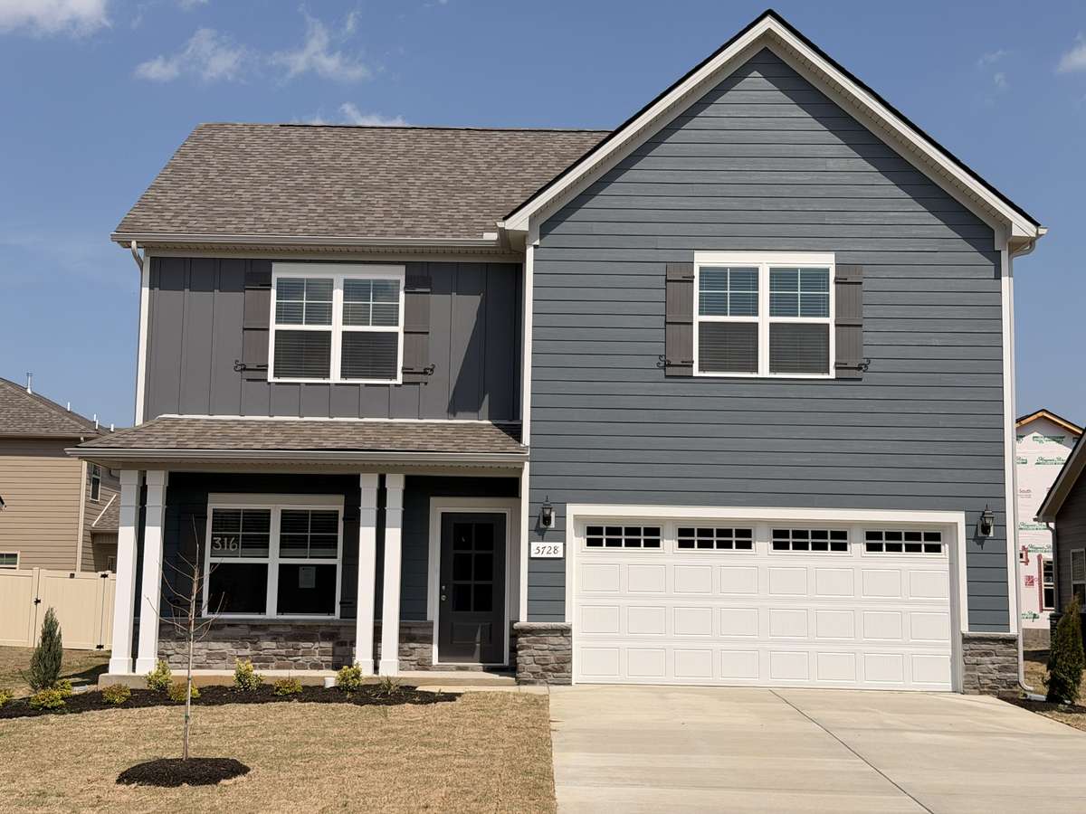 This Craftsman Styled Home features a covered front porch and four side Hardie Fiber Cement Board!