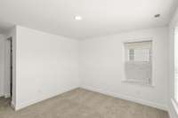 *Photo of actual home* 

Bedroom #3 is located on the 2nd floor and includes an en-suite bathroom and a walk-in closet!