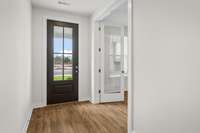Upgraded 4-lite front door allows more natural light in!