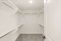 ***Photo taken from the Ashcroft model home in Lynwood Station***

His and Hers walk-in closets are included in both primary suites! Built-in shelving provides a luxurious touch while maximizing storage space.