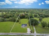STUNNING New Home w/ Incredible Setting!!!
Situated on Almost 2 Acres+/-!!!! (1.79 Acres+/- per Survey to be Exact) 
Note: White Lines are Approximation by Photography Company. Rely on Actual Survey ONLY for Exact Property Lines