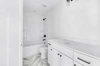 Full bathroom in primary suite