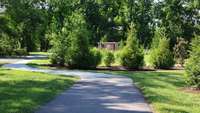 Take a walk on the tree-lined walking trail at Langford Farms!