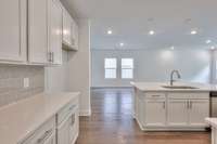 This photo is a sample of the Sutherland floorplan.  Options and exterior will vary depending on customer selections and preferences.