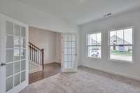 This photo is a sample of the Sutherland floorplan.  Options and exterior will vary depending on customer selections and preferences.