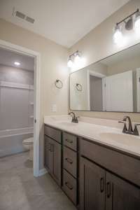 EXAMPLE>>>One of the Upstairs Guest Bathrooms, Double Vanity is Separate from the Shower and Toilet Room!