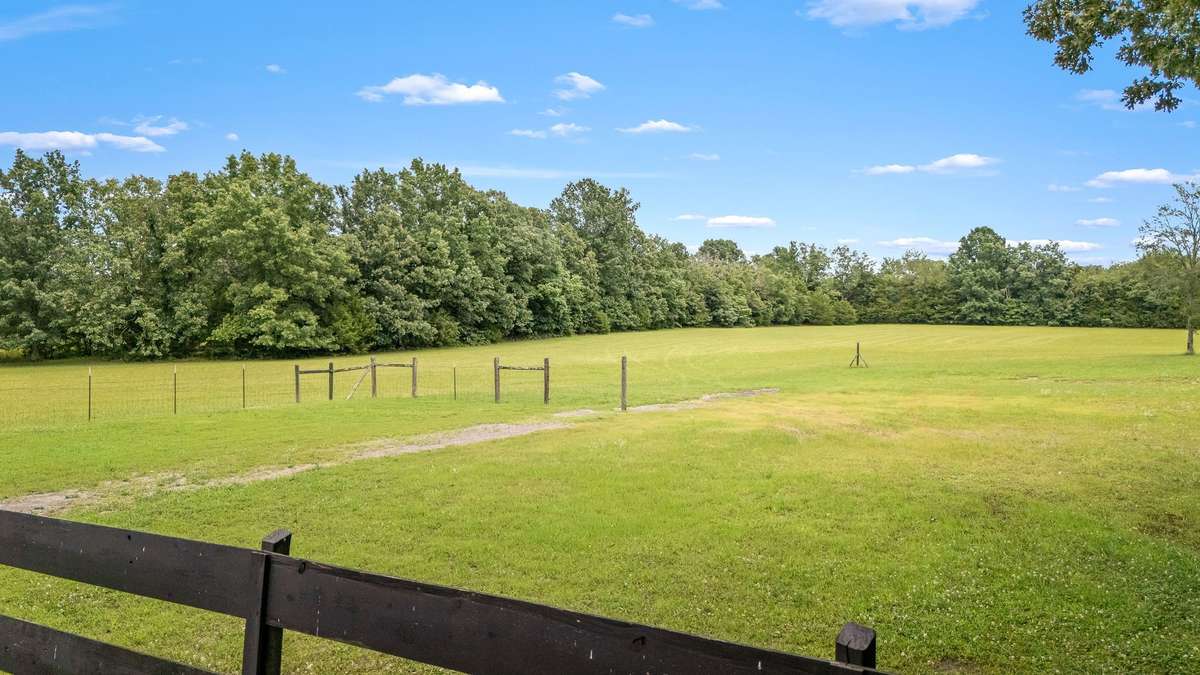 Land is fenced and cross-fenced for livestock.