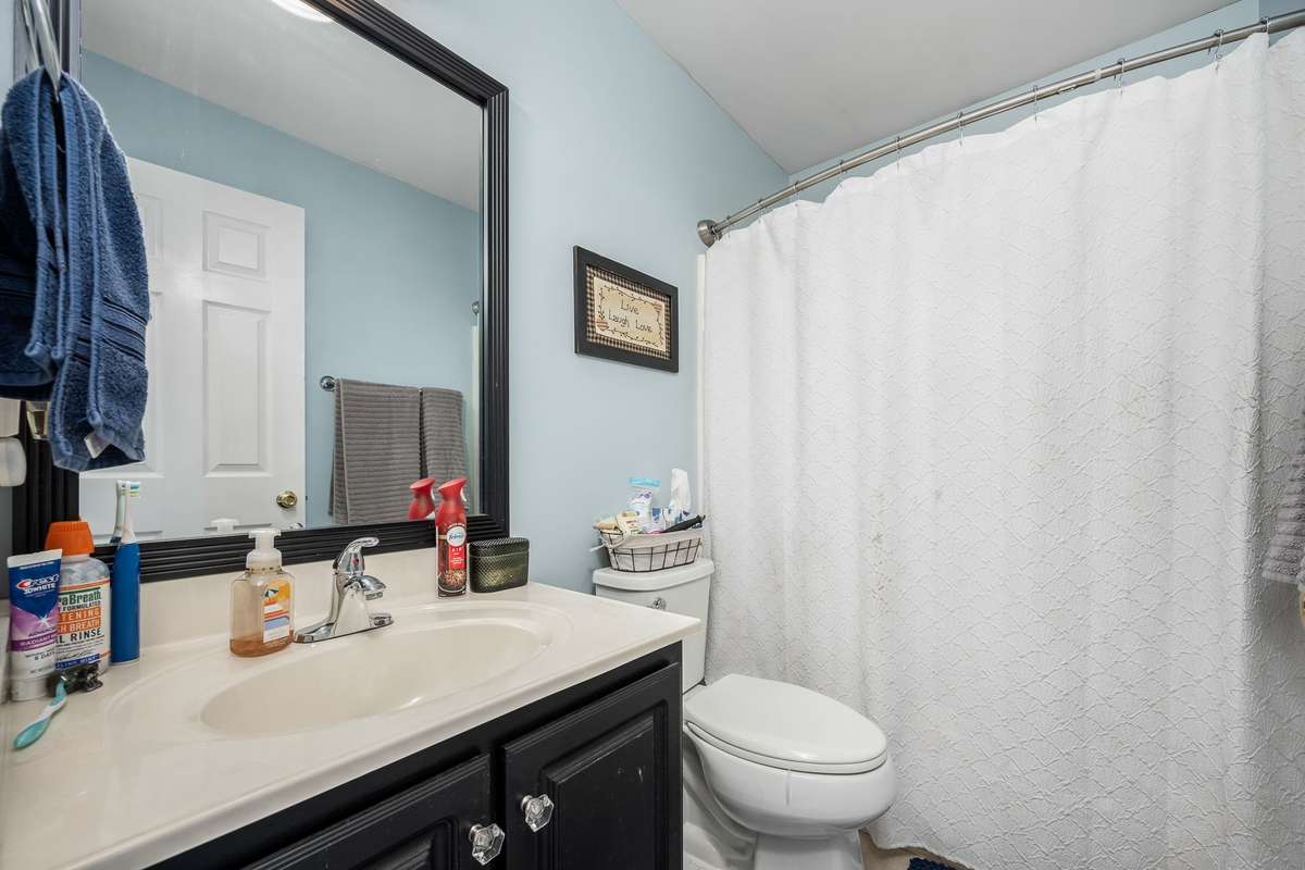 Guest Bath in hall between bedrooms 2 and 3.
