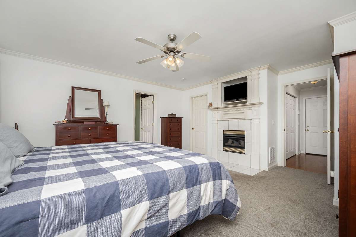 Primary Bedroom has a fireplace.