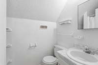 Upstairs bathroom w/ stand-up shower.