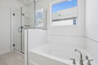 We have also included a garden tub and tiled shower!