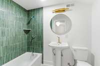 Each of the three bathrooms has been completely renovated, complementing the home’s three bedrooms with a cohesive, elevated design and like-new feel.