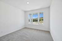 A guest suite is located on the 1st floor and is perfect for multi-generational living or those needing a dedicated home office.