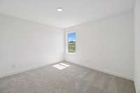 Bedroom #2 is located on the 2nd floor and measures roughly 12' x 11'. A walk-in closet is also included with this bedroom.