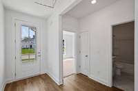 Bedrooms 2 + 3 are located at the front of the home, complete with full bath and linen closet.