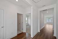 Bedrooms 2 + 3 are located at the front of the home, complete with full bath and linen closet.