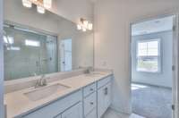 Photo is of Model home selection of actual home may vary