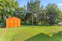 The exterior shed is 16x10. A large section of the spacious back yard is fenced.