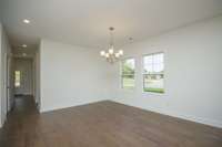 Photos displayed are of a model home. Actual options, finishes, colors, and selections may differ in the home being offered for sale.