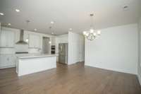 Photos displayed are of a model home. Actual options, finishes, colors, and selections may differ in the home being offered for sale.