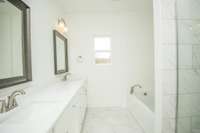 Photos displayed are of a model home. Actual options, finishes, colors, and selections may differ in the home being offered for sale.