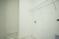 Photos displayed are of a model home. Actual options, finishes, colors, and selections may differ in the home being offered for sale.