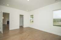 Photos displayed are of a model home. Actual options, finishes, colors, and selections may differ in the home being offered for sale.